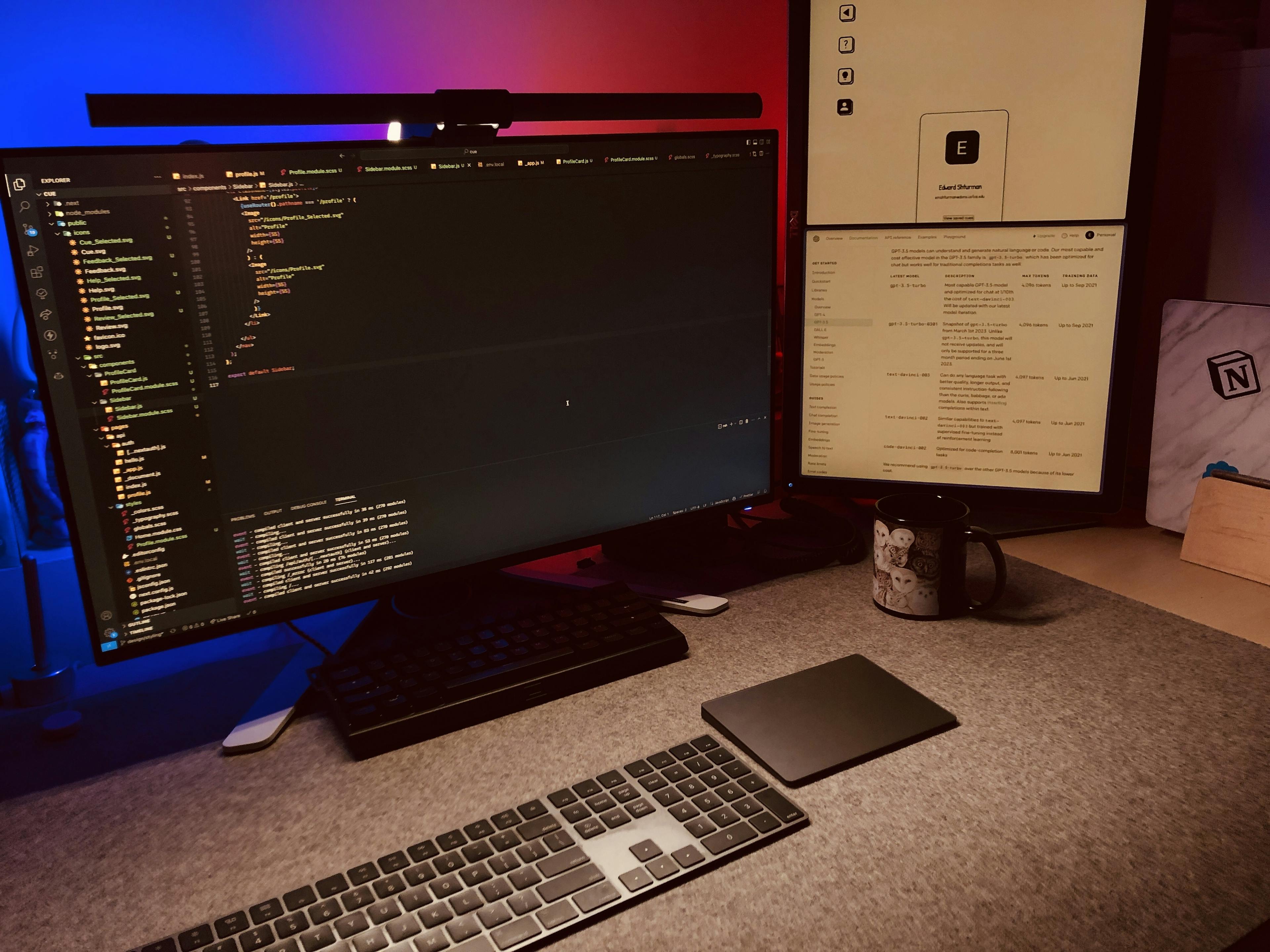 My desk setup on Saturday night. Pictured is my dual-monitor setup (code on one, API docs and live preview on the other) and a cup of tea.